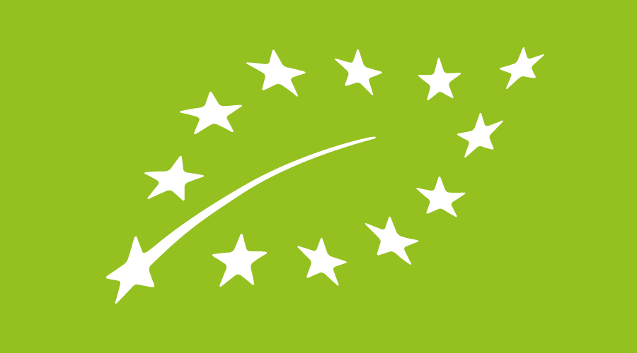 Grüner Hintergrund mit weißen Sternen in Blattform angeordnet